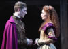 Henry in royal shirt and purple cape faces Katherin in bejeweled dress